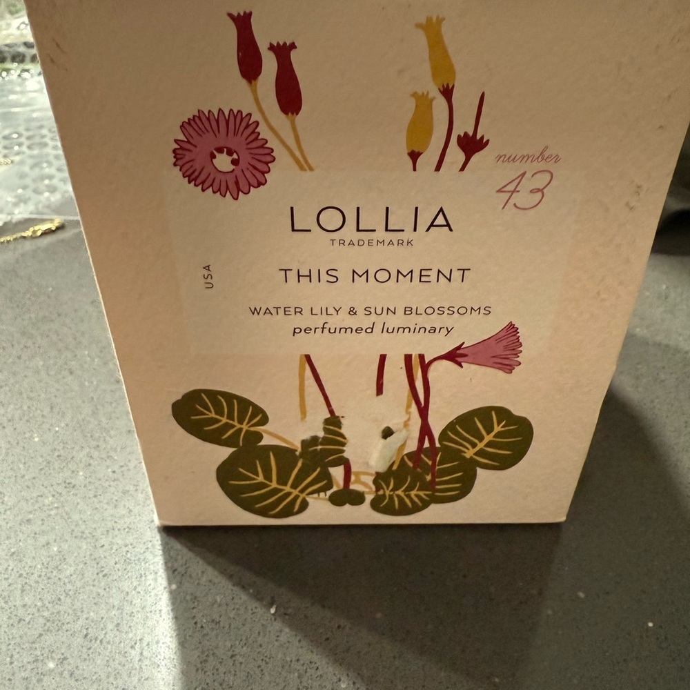 Lollia Candle. This Moment. Water Lily and Sun Blossoms.